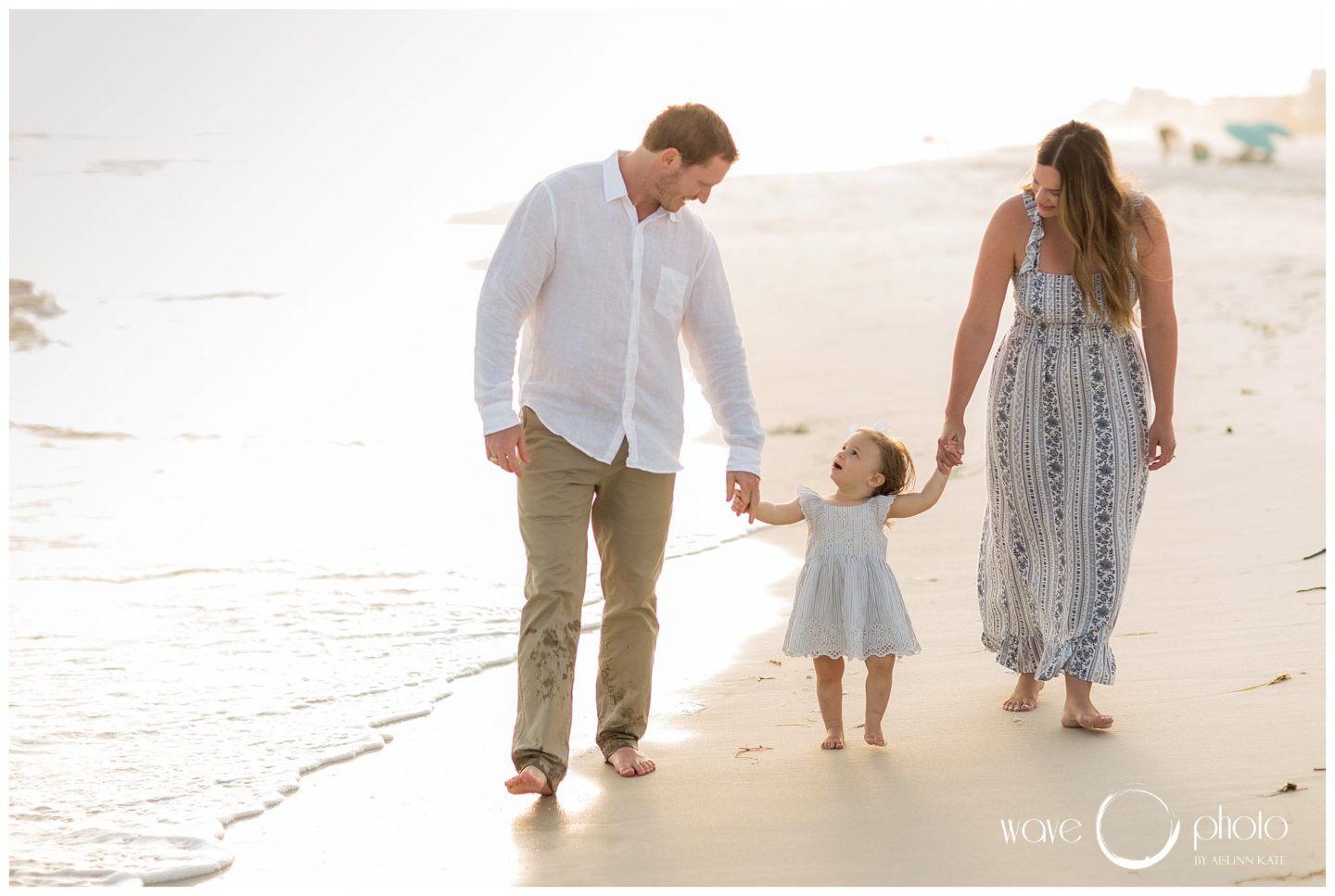family-walking-on-beach-30A-florida
