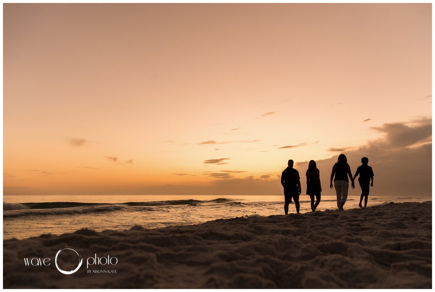 family-walking-on-beach-at-sunset-30A-florida