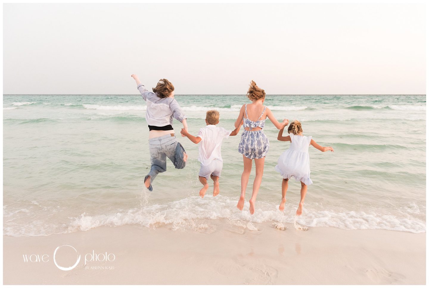 family-jumping-into-water-destin-florida
