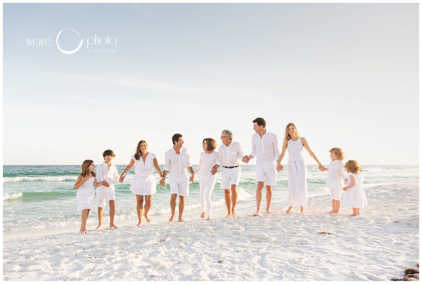 group-family-photo-holding-hands-on-beach-destin-florida