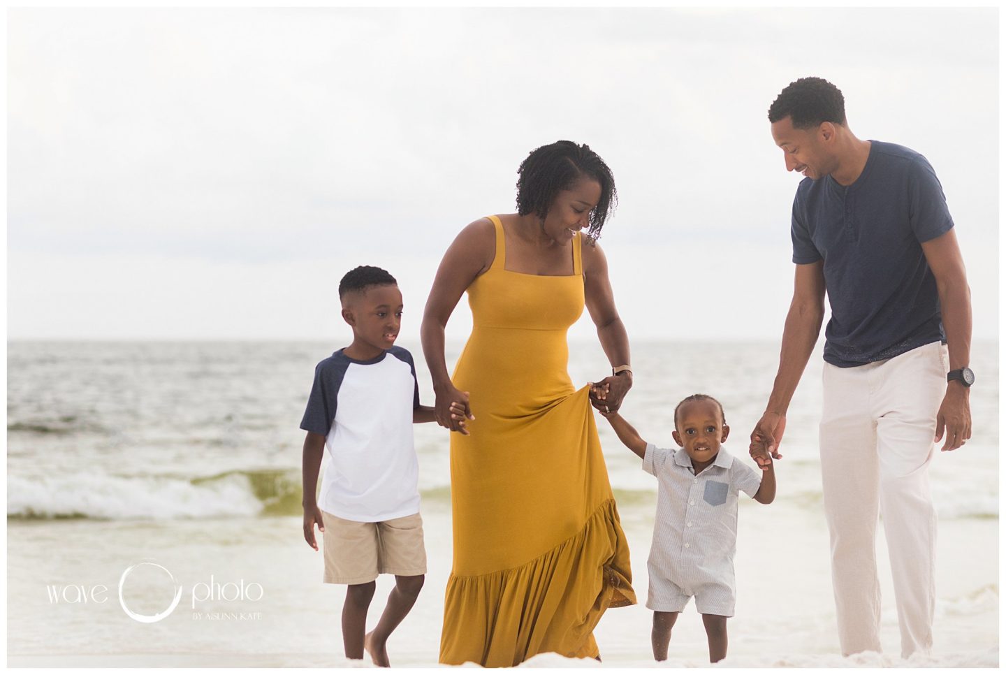 family-holding-hands-on-beach-destin-florida