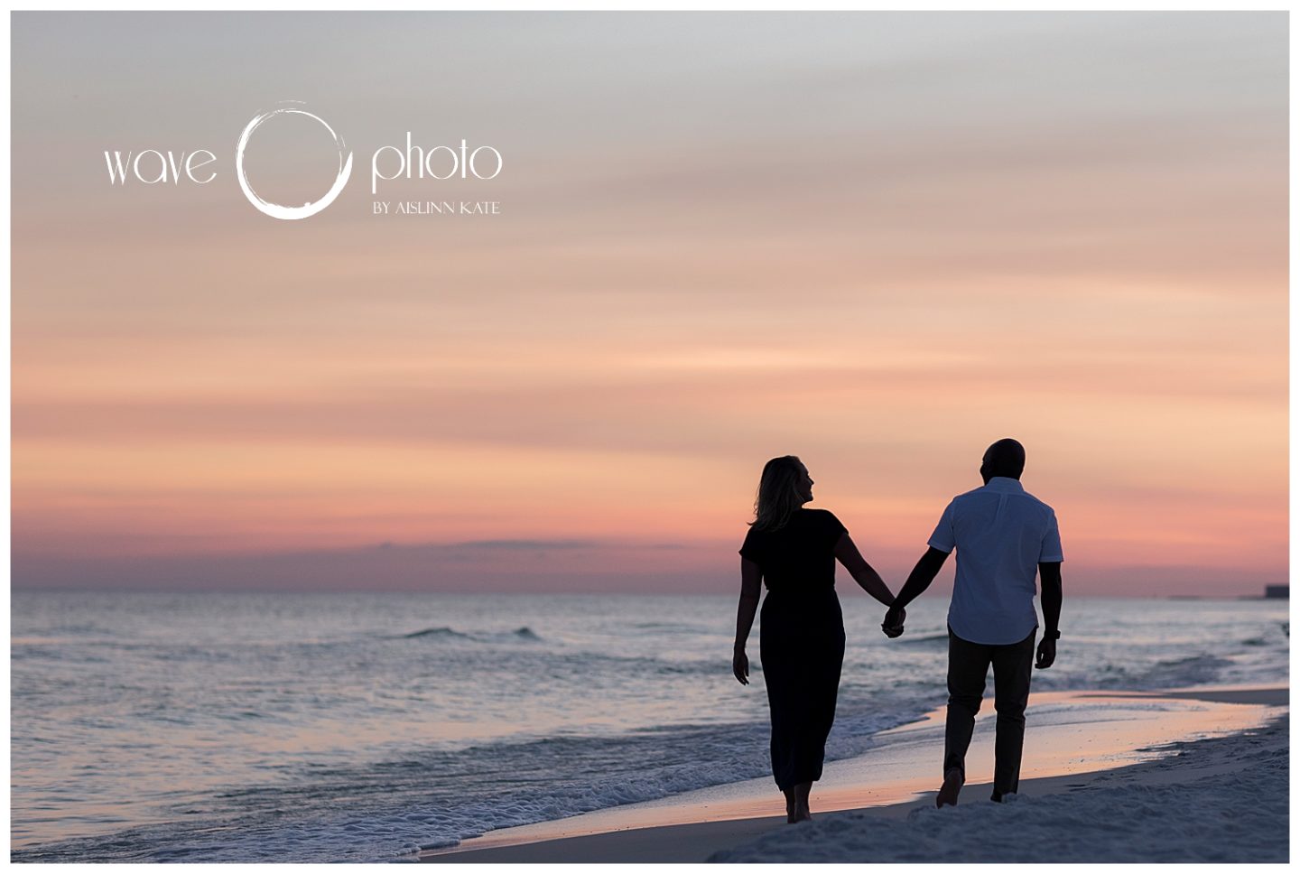 couple-holding-hands-on-beach-at-sunset-destin-florida