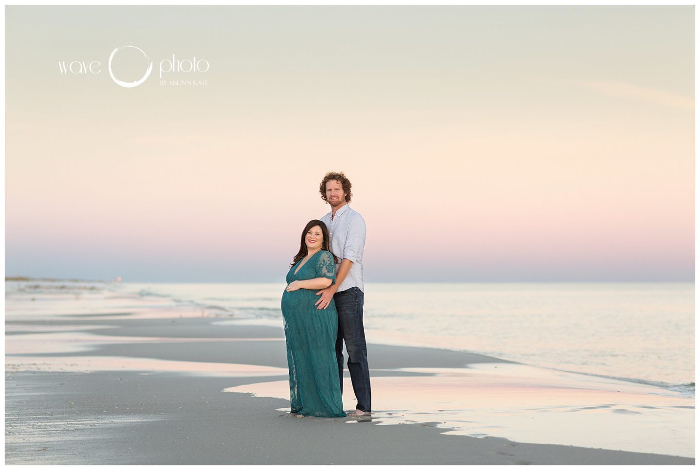 maternity-couple-on-beach-with-sunset-fort-pickens-beach