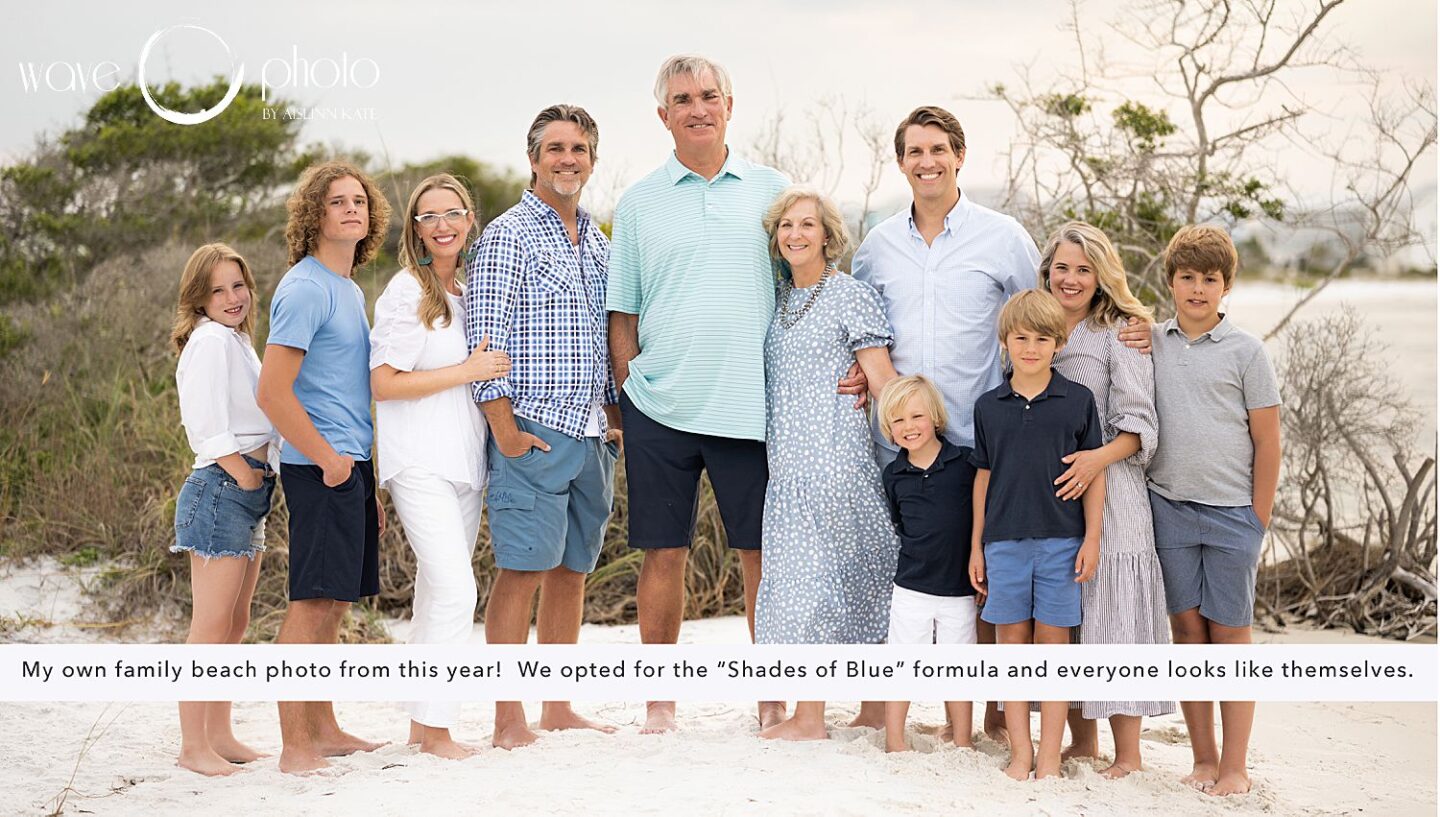 extended family on the beach at sunset wearing blue and white